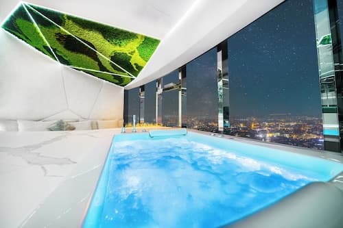 Apartments in Sky Tower with Bathtub near the window