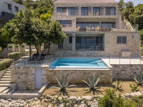 Beachfront Villa Poseidon with Heated Pool