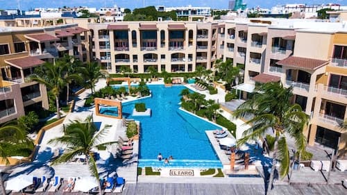 Ground floor, luxury 2 bedroom condo with pool view at El Faro by DPM