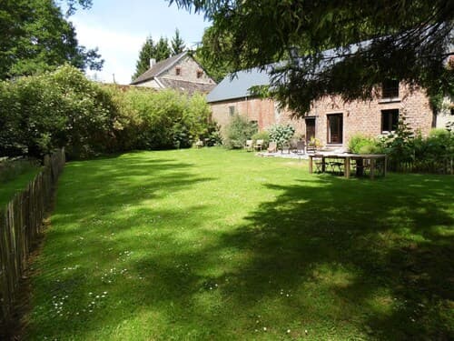 Regional House With Exposed Timber Frame Elements Full of Authenticity and Charm in a Green Area