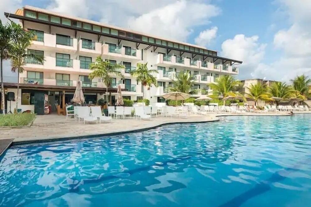 Loft com saida para piscina by Laguna Beach