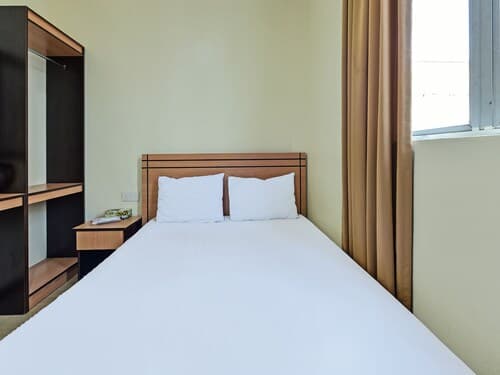 SPOT ON 92255 Lucky Guesthouse
